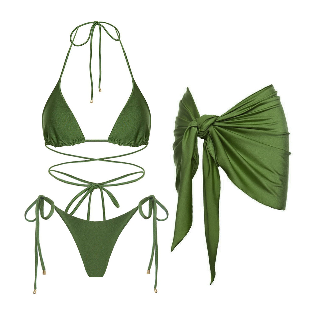 Green two-piece bikini set with tie closures and a matching wrap skirt.