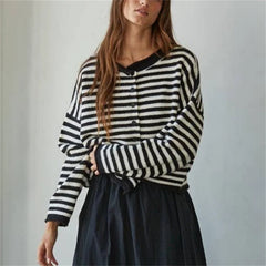 Black and white striped knit coat with button-up closure