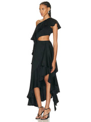 Black one-shoulder dress with ruffled layers on a white background