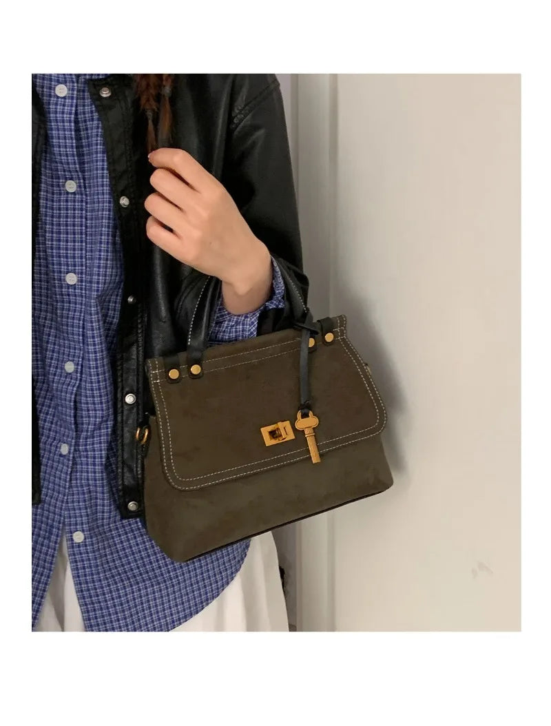 compact flap satchel purse,
