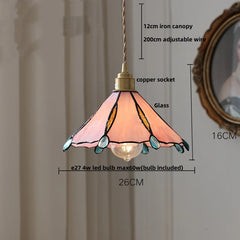 Pendant light with stained glass shade and measurements on a neutral background