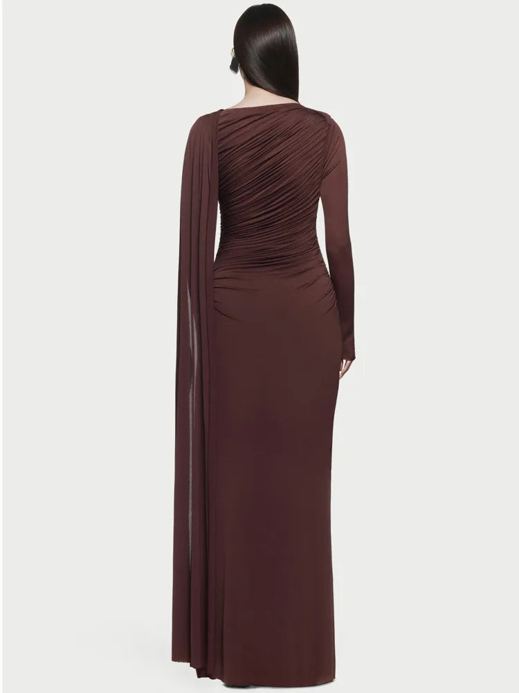 Brown evening gown with long sleeves on a white background
