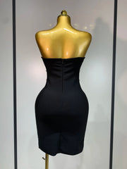 Back view of strapless pearl and rhinestone bodycon mini dress