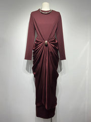 Full length dress with flowing drape and refined structure