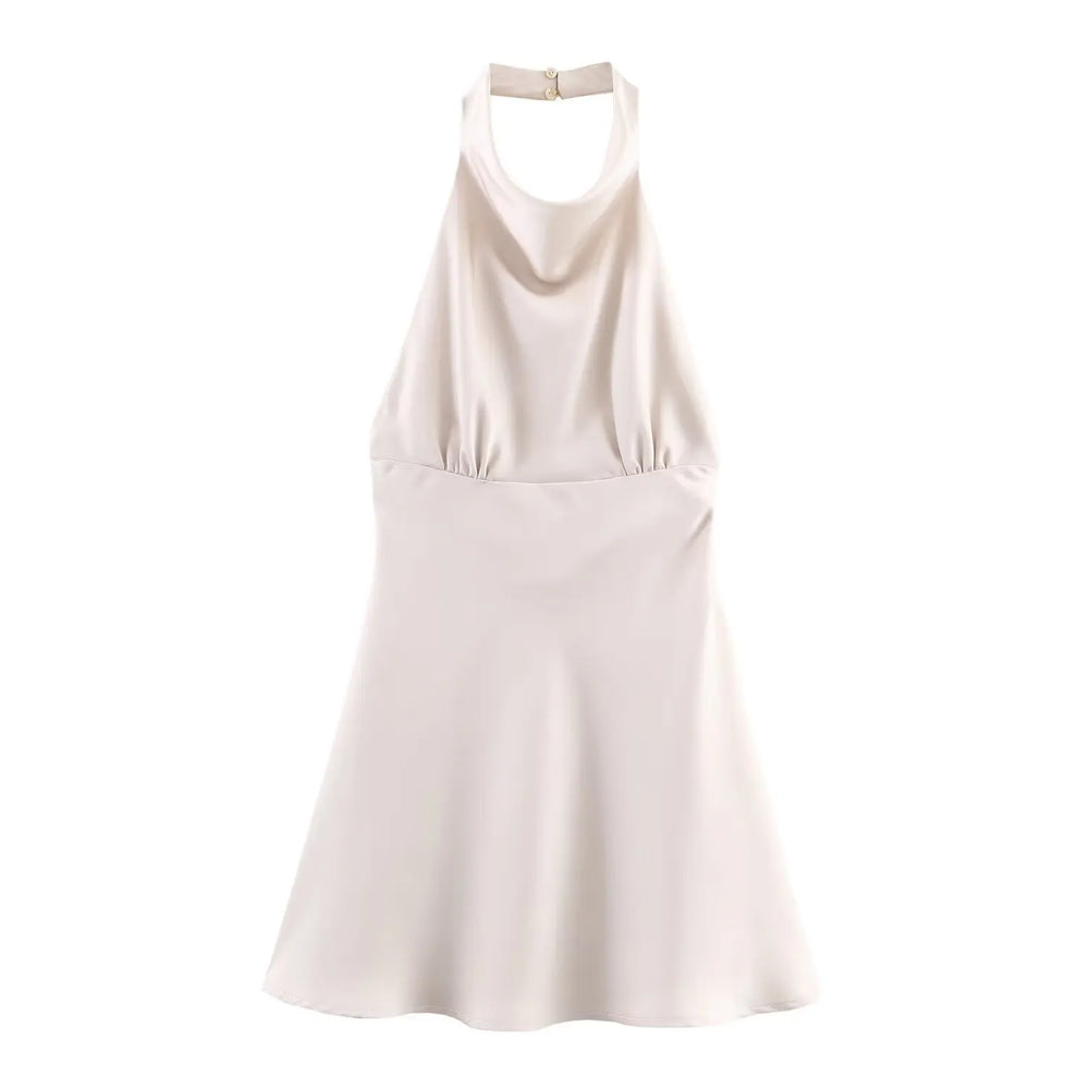 White halter neck dress on a white background