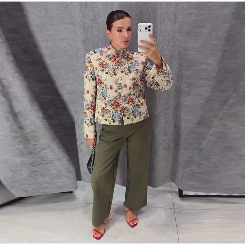 Floral mandarin collar cropped jacket worn with trousers