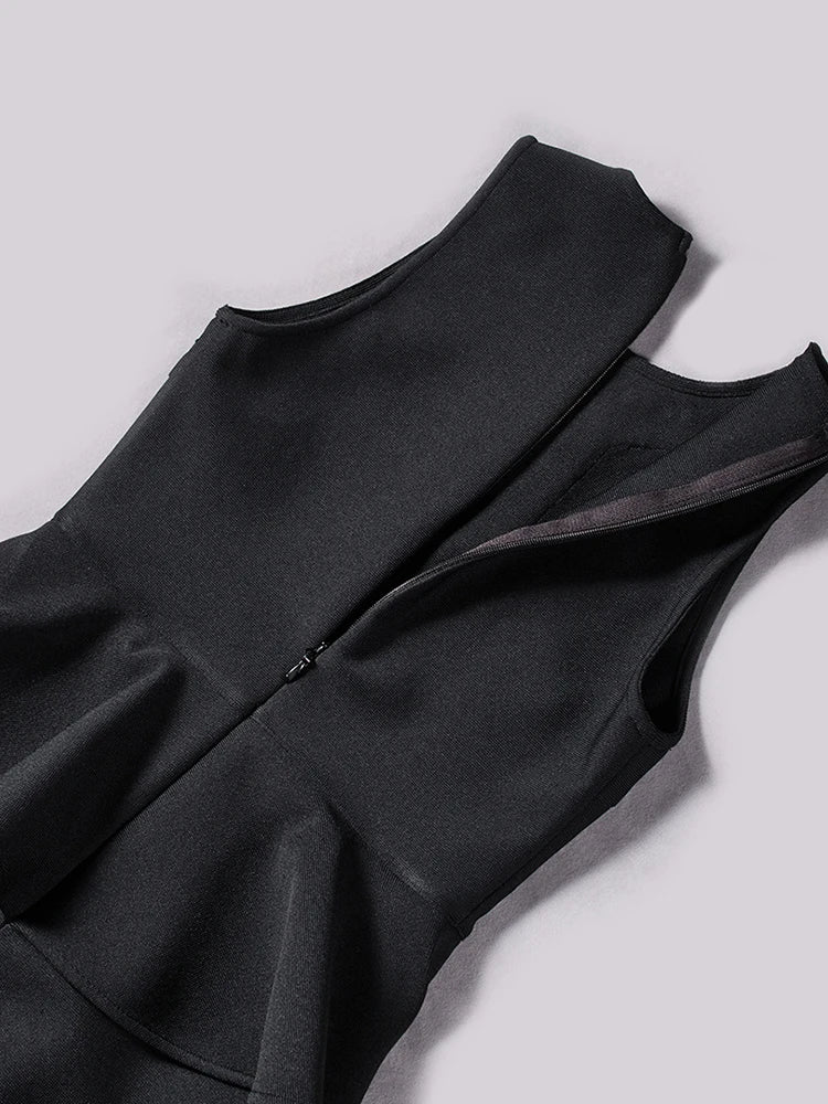 Black sleeveless top on a light gray background