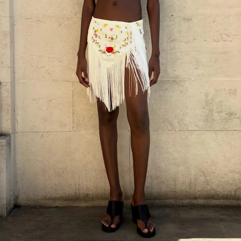 White floral embroidered mini skirt with fringe
