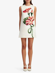 Close-up of floral embroidery on sleeveless mini dress