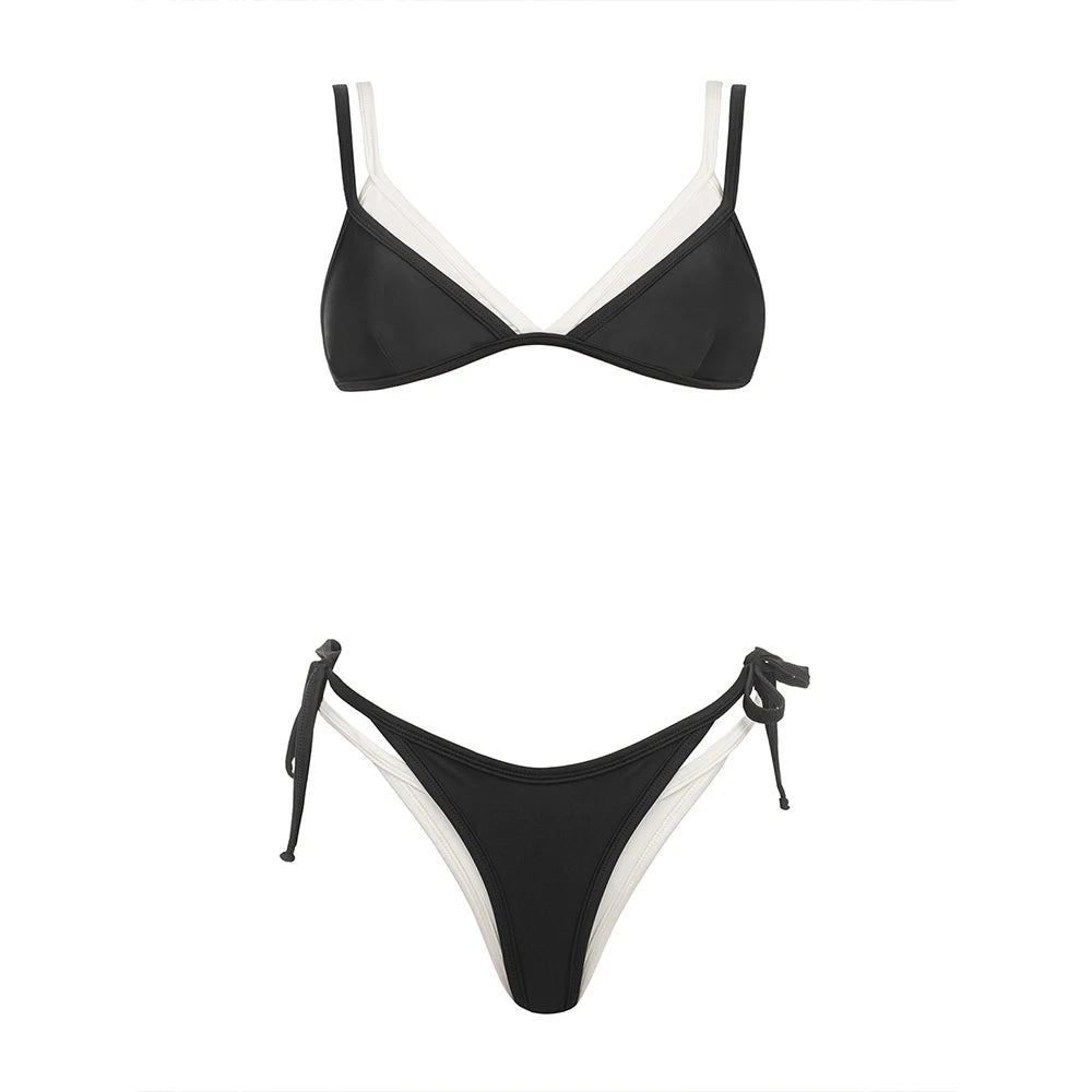 Black and white contrast trim bikini set laid flat