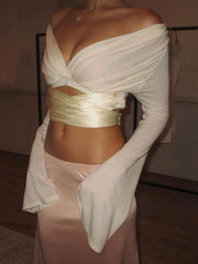 Off shoulder wrap crop top with bell sleeves and satin sash