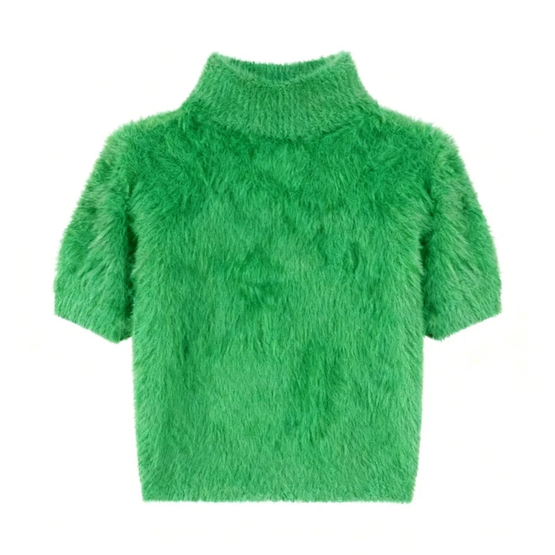 Green fluffy sweater on a white background