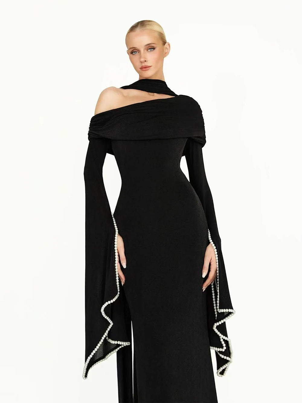 Off shoulder trumpet sleeve beaded neck long black dress front detail view