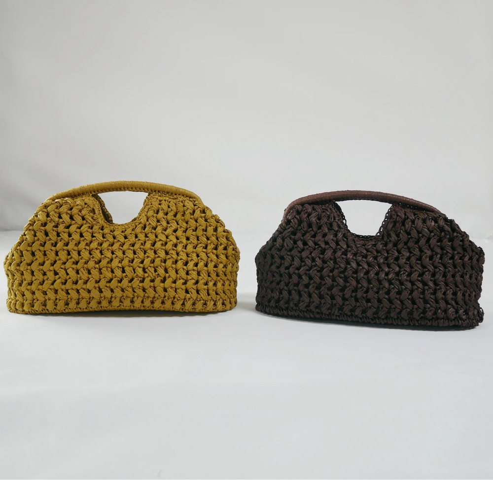 Two crocheted bags, one mustard yellow and one brown, on a white surface.