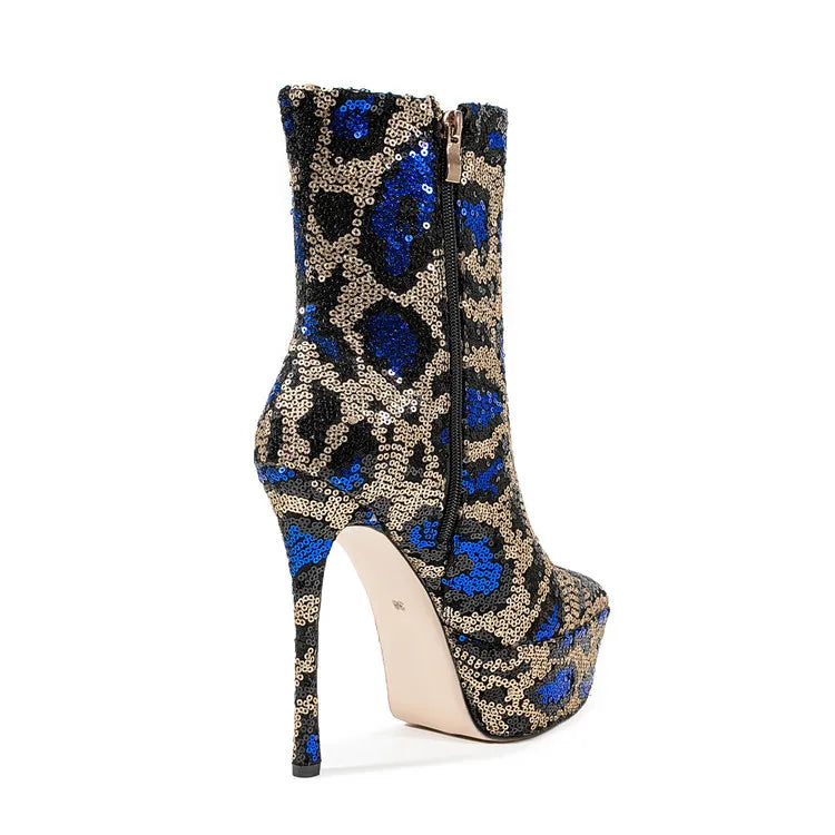 High-heeled boot with blue and gold pattern on a white background