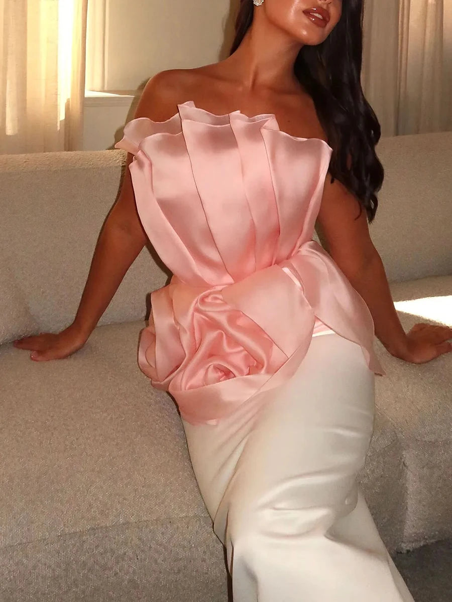 Close-up of a pink 3D flower strapless top