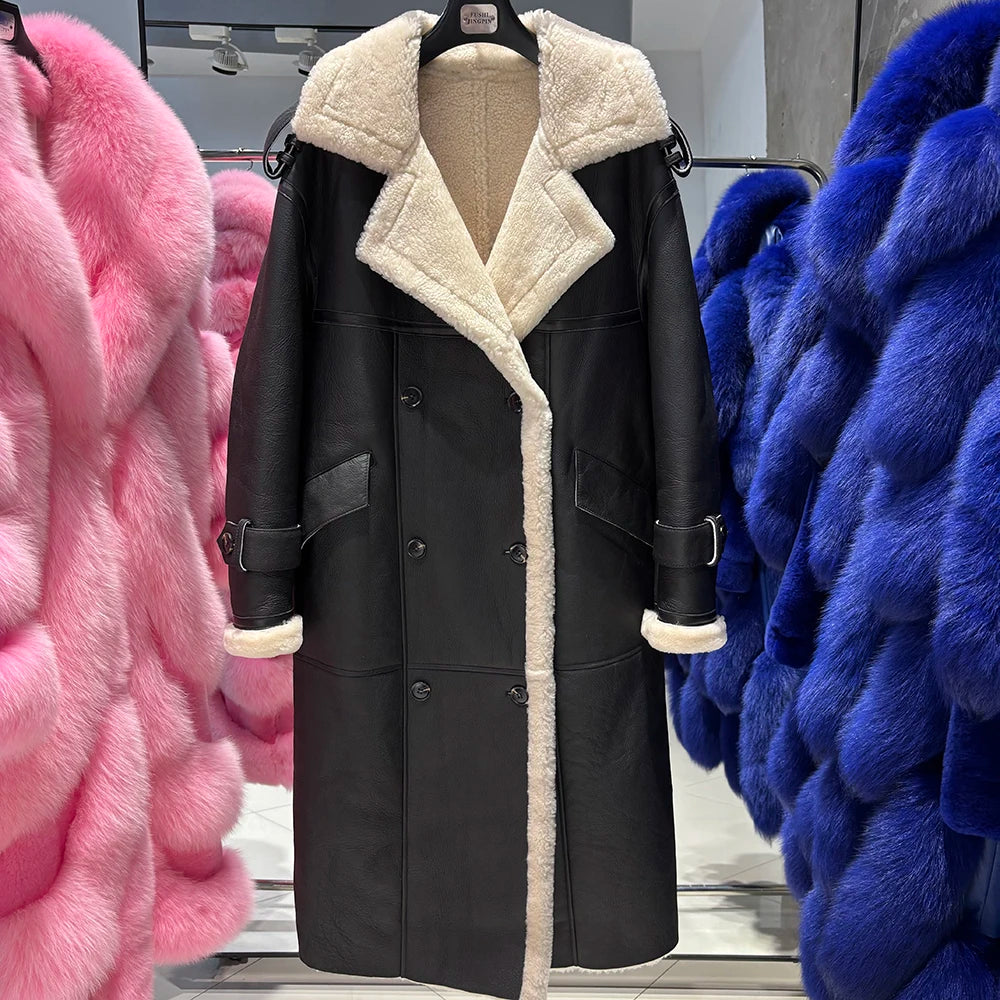 Black coat with white fur lining displayed against a colorful fur background