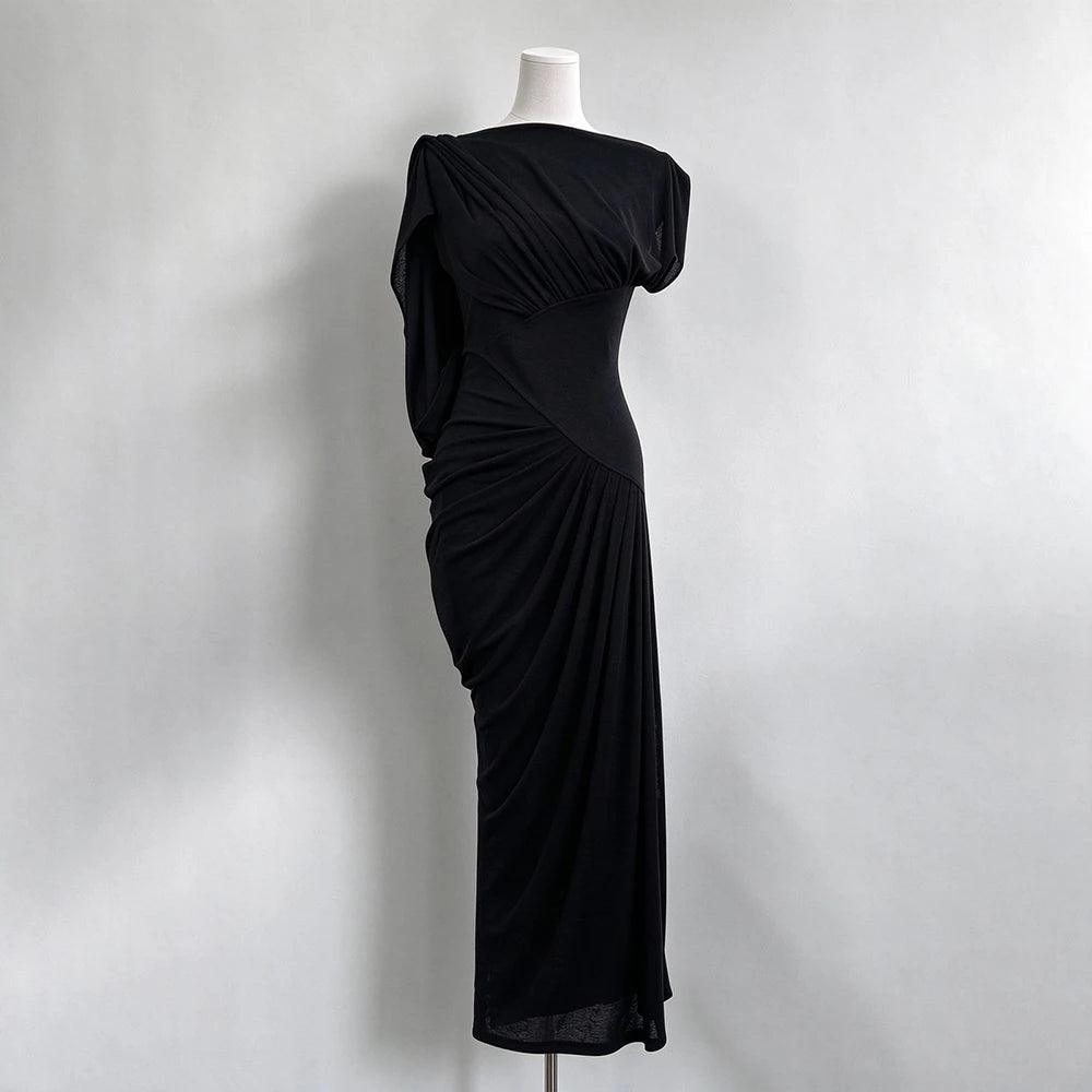 Black draped maxi dress on mannequin