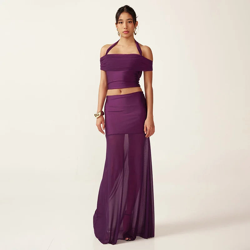 Purple mesh two-piece set with sheer backless halter top and long skirt for women.