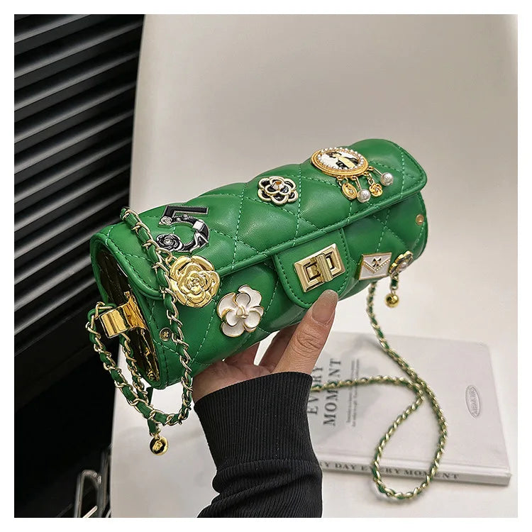 Green quilted embellished barrel bag