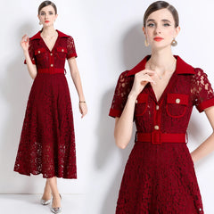 Red lace dress with a belt worn by a model on a white background