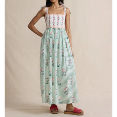 Maxi dress with floral print bodice, green striped skirt, and tie shoulder straps