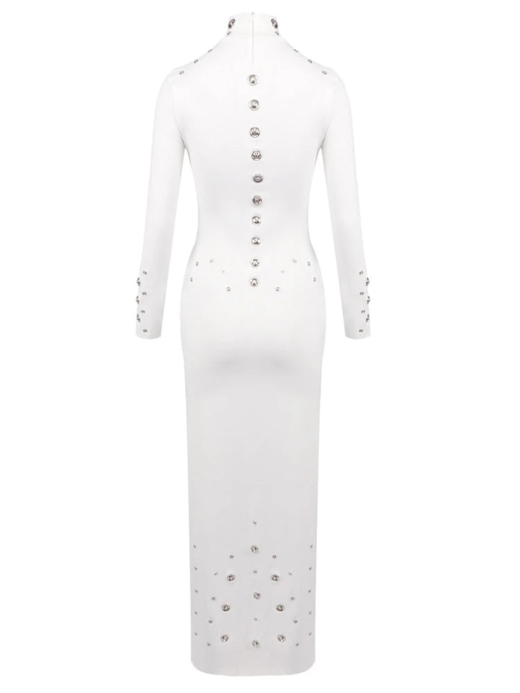 White dress with decorative buttons and embellishments