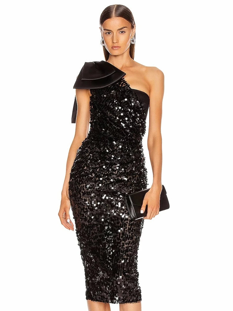 Black one shoulder sequin midi dress with bow accent
