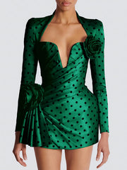 Back view of fitted polka dot ruched draped v-neck long sleeve mini dress