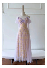 Embroidered butterfly tulle overlay maxi dress on mannequin
