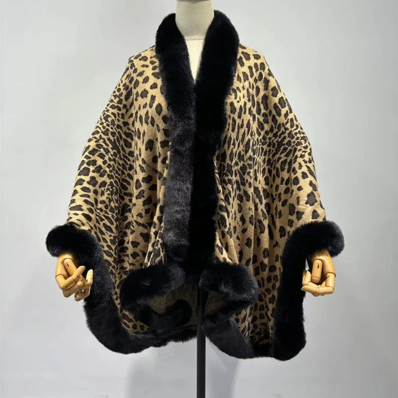 Leopard print coat with black fur trim on a mannequin against a gray background