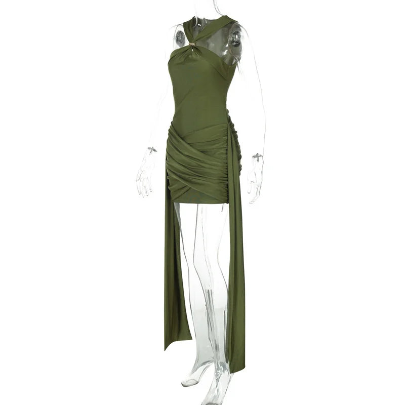Green dress on a mannequin against a white background