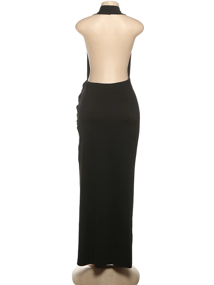 Black evening gown on a mannequin with a white background