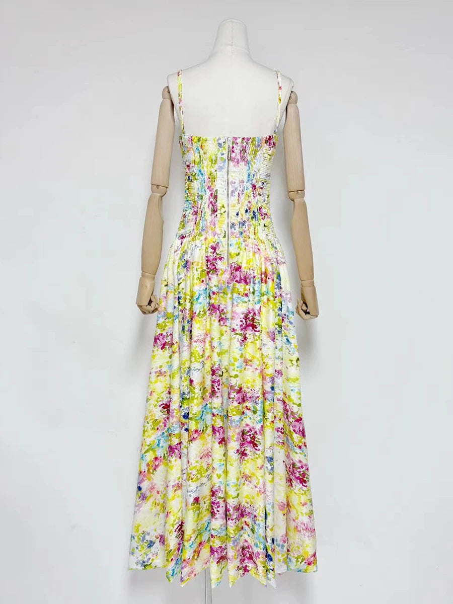 Mannequin wearing a colorful floral dress 