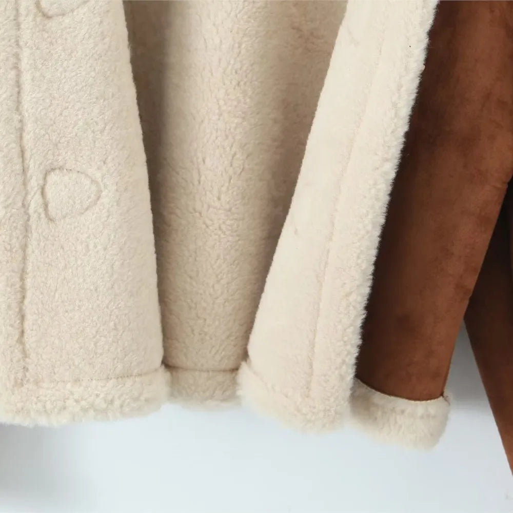 Close-up of beige and brown textured fabric with a heart shape.