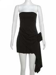 Black strapless dress on a mannequin with 'Nsauye' branding