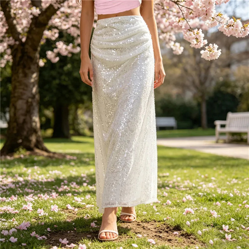 Ruched sequin maxi skirt styled outdoors with cherry blossoms