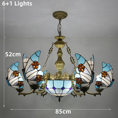 Stained glass chandelier with butterfly design and measurements on a gray background
