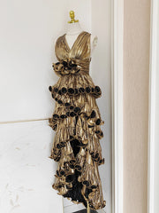 Metallic maxi dress styled for statement evening events