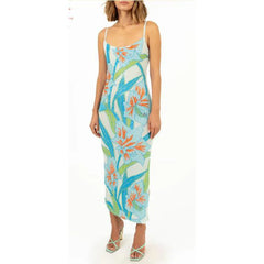 Woman wearing a floral dress with a white background