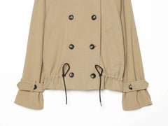 Drawstring waist detail on double breasted coat