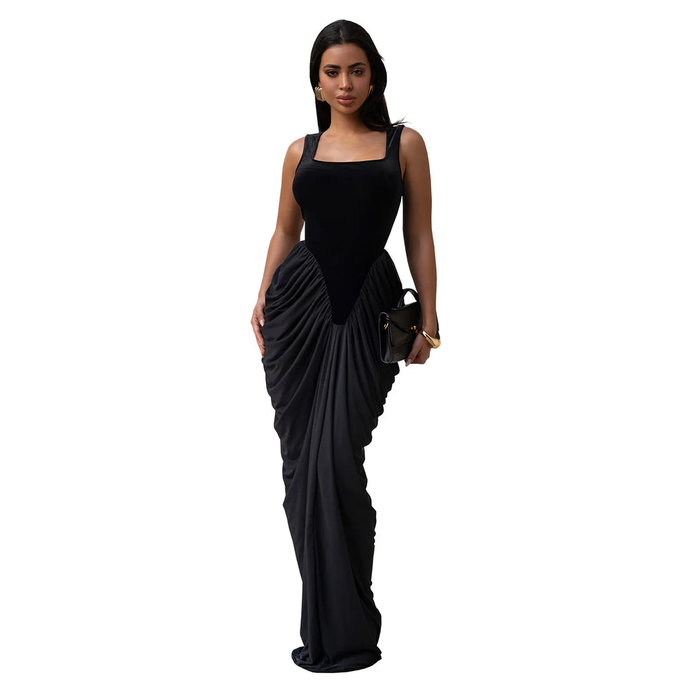 Woman wearing a black evening gown on a white background