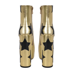 Gold boots with black star designs on a white background