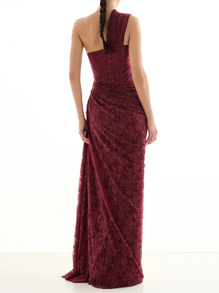 Maroon one-shoulder evening gown on a white background