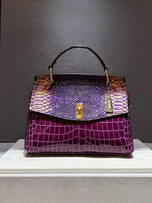 Purple embossed leather satchel bag with snake print flap