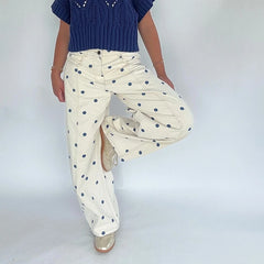 Cream wide leg jeans with blue polka dots
