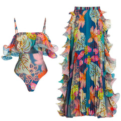 Tropical print one-piece swimsuit and matching ruffled skirt displayed separately.