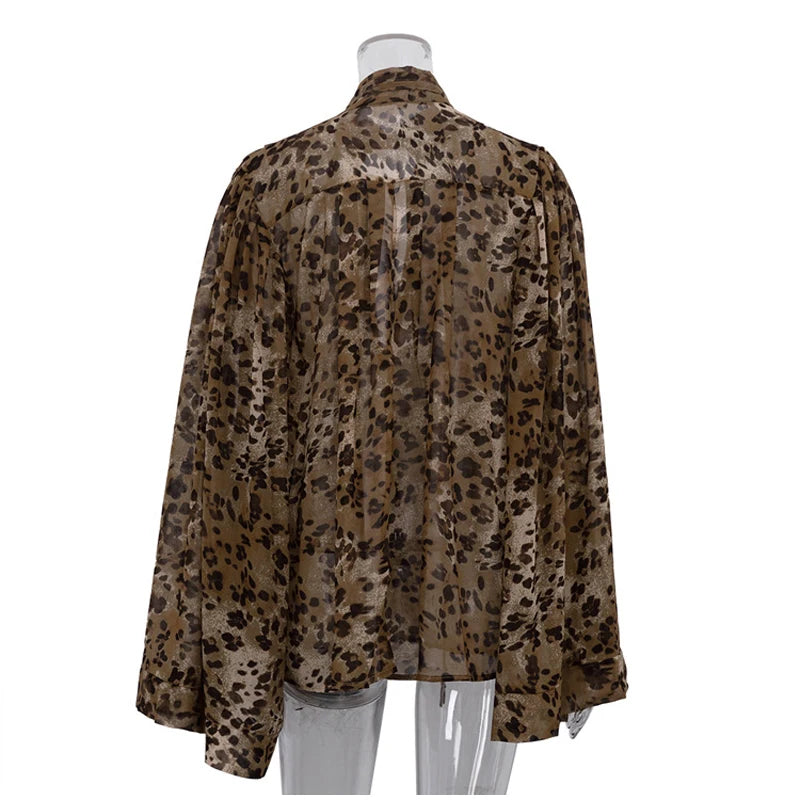 Leopard print shirt on a mannequin against a white background