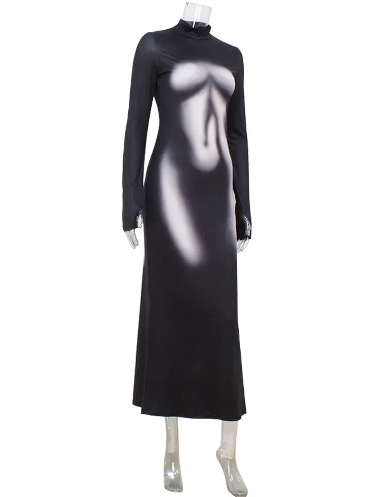 Black dress on a mannequin against a white background