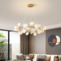 Sleek modern LED pendant light hanging in a contemporary living room. Golden Atelier 2